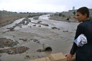A view of Lyari River from the bridge during rainfall in the city