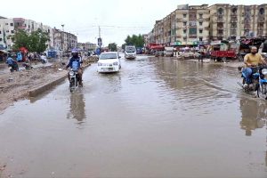 A view of Lyari River from the bridge during rainfall in the city
