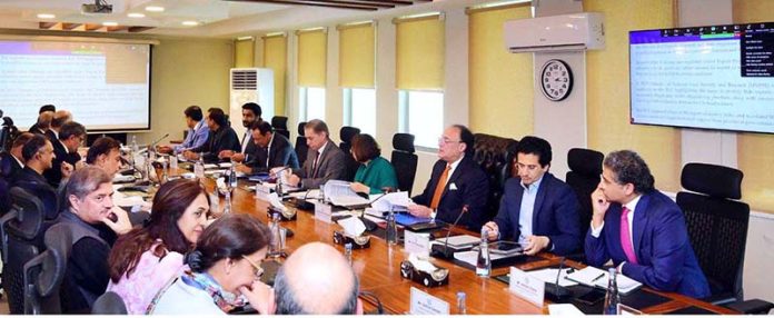 Federal Minister for Finance and Revenue, Senator Muhammad Aurangzeb, chairing a meeting of the Economic Coordination Committee (ECC) of the Cabinet at the Finance Division
