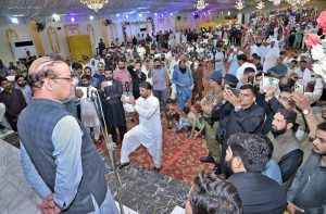 Minister of State for Development and Planning Chaudhry Armaghan Subhani addresses flood victims in the Bajwat area.