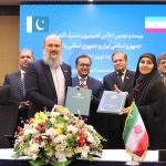 Federal Minister for Commerce, Jam Kamal Khan and Iranian Minister for Roads and Urban Development, Farzaneh Sadeq, exchanging the notes after signing protocols in Pak-Iran 22nd JEC Meeting.