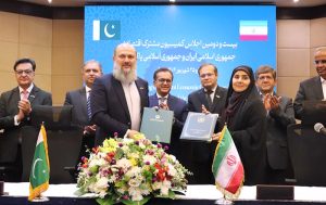 Federal Minister for Commerce, Jam Kamal Khan and Iranian Minister for Roads and Urban Development, Farzaneh Sadeq, exchanging the notes after signing protocols in Pak-Iran 22nd JEC Meeting.