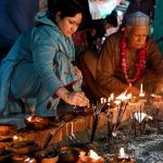 Devotees lighting candles and earthen lamps at the shrine of Sufi saint Hazrat Mian Mir during the 402nd Urs celebration.