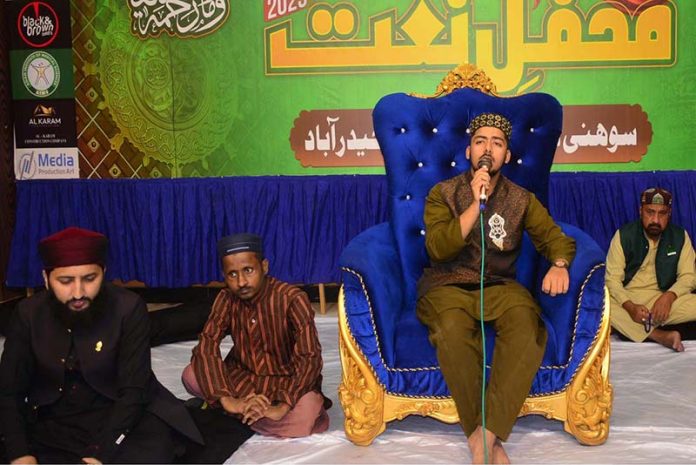 Naat Khawan recites Naat during a Mehfil-e-Milad organized by Sohni Dharti Youth Council at Global Hall