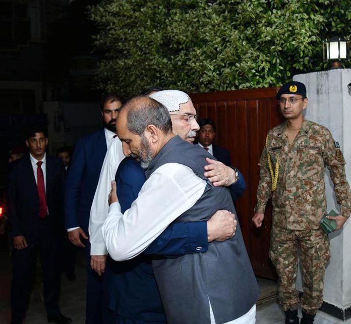President Asif Ali Zardari visiting the residence of Major Syed Moiz Abbas Shah Shaheed