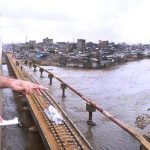 Sindh Chief Minister Syed Murad Ali Shah, accompanied by provincial ministers, inspects the Lyari River flowing at peak levels near the Machhar Colony section of the Lyari Expressway