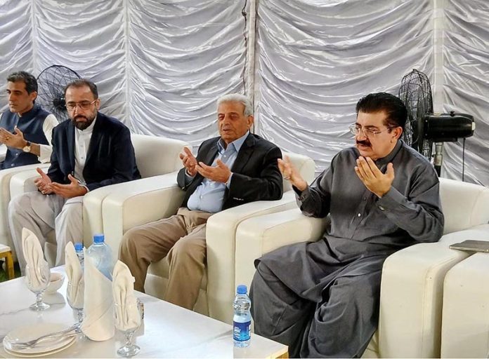 Federal Minister for National Food Security & Research, Rana Tanveer Hussain offering condolences to former Senate Chairman Sadiq Sanjrani at his residence over the demise of his father