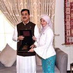 Chairman Senate, Syed Yusuf Raza Gillani, presenting a souvenir to Ar. Siti Rozaimeriyanty Dato Haji Abdul Rahman, Secretary General of the ASEAN Inter-Parliamentary Assembly (AIPA), at his residence