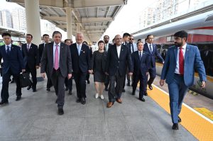 President Zardari travels by a high-speed train in China; briefed on operations