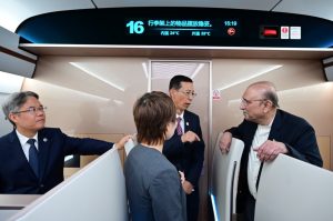 President Zardari travels by a high-speed train in China; briefed on operations