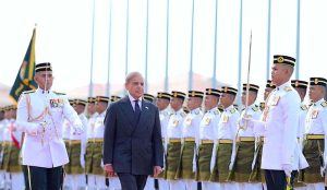 Prime Minister Muhammad Shehbaz Sharif inspects the Guard of Honour at Malaysian Prime Minister's Office (Purdana Putra).