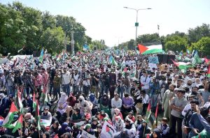 Ameer Jamat-e-Islami Hafiz Naeem-ur-Rehman addressing the participants of Gaza March organized by Jamat-e-Islami to express solidarity with the Palestinians at Faisal Avenue.