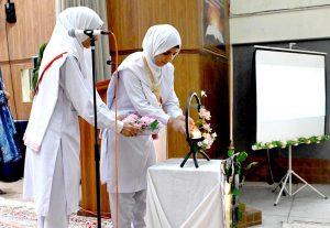 Parliamentary Secretary, Ministry of Federal Education and Professional Training, Ms. Farah Naz Akbar participating in a candle exchange between the head girls of outgoing and incoming office bearers during the Student Council Investiture Ceremony 2025-26 of Islamabad Model College for Girls I-10/4 sector