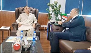 Federal Minister for Maritime Affairs Muhammad Junaid Anwar Chaudhry talking to Egypt's Ambassador, Dr. Ihab Mohamed Abdelhamid Hassan who called on him