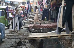 A view of the ongoing development work by the Rawalpindi Development Authority (RDA) to clean, extend and cover the open sewage drain, aimed at ensuring a cleaner and healthier environment for local residents.