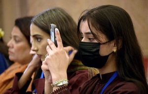A participant captures the moment with her mobile phone during the Two-Day International Dialogue on “TVET in the Shifting Socio-Economic Paradigm” at a local hotel.