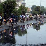 Sewerage water accumulated on Millat Road causes inconvenience for drivers, highlighting the urgent need for intervention by authorities