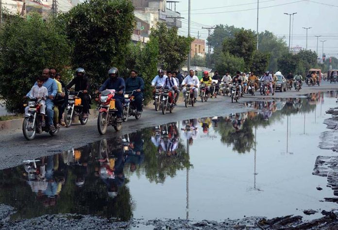 Sewerage water accumulated on Millat Road causes inconvenience for drivers, highlighting the urgent need for intervention by authorities