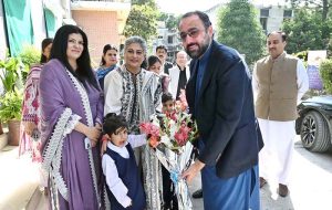 Federal Minister for Overseas Pakistanis and Human Resource Development, Chaudhry Salik Hussain being presented flower bouquet on his arrival at Investiture Ceremony of PBF International School & College H-9.