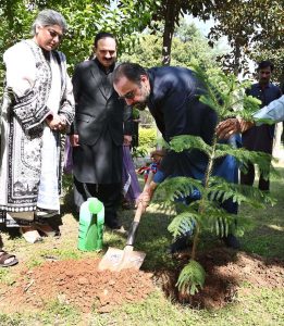 Federal Minister for Overseas Pakistanis and Human Resource Development, Chaudhry Salik Hussain being presented flower bouquet on his arrival at Investiture Ceremony of PBF International School & College H-9.