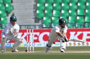 Pakistan’s batsman Salman Agha plays a shot on the second day of the first Test match between Pakistan and South Africa at the Gaddafi Stadium