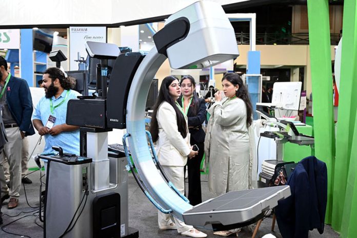 Visitors take interest in a stall during the second day of the Health Asia Exhibition at the Expo Centre Visitors take interest in a stall during the second day of the Health Asia Exhibition at the Expo Centre