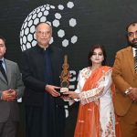 Federal Minister for Planning, Development and Special Initiatives Prof. Ahsan Iqbal distributing awards during ceremony in connection with Teachers' Day