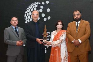 Federal Minister for Planning, Development and Special Initiatives Prof. Ahsan Iqbal distributing awards during ceremony in connection with Teachers' Day