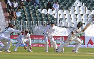 Pakistani batter Abdullah Shafique plays a shot during the first day of the second Test match between Pakistan and South Africa at the Rawalpindi Cricket Stadium.