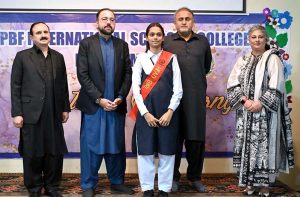 Federal Minister for Overseas Pakistanis and Human Resource Development, Chaudhry Salik Hussain being presented flower bouquet on his arrival at Investiture Ceremony of PBF International School & College H-9.