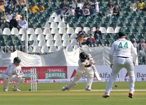 Pakistani batter Abdullah Shafique plays a shot during the first day of the second Test match between Pakistan and South Africa at the Rawalpindi Cricket Stadium.