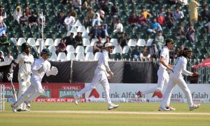 South Africa’s players celebrate after the run-out of Pakistani batter Shaheen Afridi during the fourth day of the second Test match between Pakistan and South Africa at Rawalpindi Cricket Stadium.