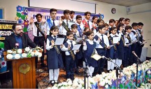 Federal Minister for Overseas Pakistanis and Human Resource Development, Chaudhry Salik Hussain being presented flower bouquet on his arrival at Investiture Ceremony of PBF International School & College H-9.