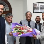 Advocate General Punjab, Muhammad Amjad Pervaiz, presents a bouquet to Federal Minister for Law and Justice, Azam Nazir Tarar, to welcome him at the Advocate General’s Office, Punjab.