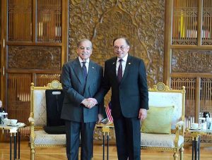 Prime Minister of Pakistan Muhammad Shehbaz Sharif and Prime Minister of Malaysia Dato Seri Anwar Ibrahim shake hands prior to their meeting at Purdana Putra (Malaysian Prime Minister's Office).