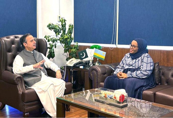 Federal Minister for Maritime Affairs, Muhammad Junaid Anwar Chaudhry talking to Rwandan Ambassador Harerimana Fatou, who called on the minister at his office