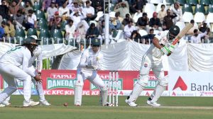 South Africa's players celebrate the dismissal of Pakistani batter Abdullah Shafique during the first day of the second Test match between Pakistan and South Africa at the Rawalpindi Cricket Stadium.