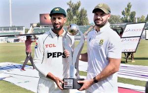 Pakistan captain Shan Masood and South Africa captain Aiden Markram share trophy after the Test series ended in a 1-1 draw at Rawalpindi Cricket Stadium.