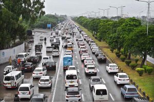 A view of massive traffic jam at Islamabad Expressway during rain that experienced the Federal Capital.