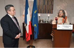 French Ambassador Nicolas Galey conferring the Ordre des Arts et des Lettres award on Fizza Hasan in recognition of her contributions to promoting theatre and Francophonie in Pakistan