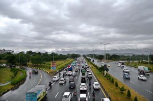 A view of massive traffic jam at Islamabad Expressway during rain that experienced the Federal Capital.