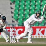 South African batsman Ryan Rickelton plays a shot during the second day of the first Test match between Pakistan and South Africa at the Gaddafi Stadium