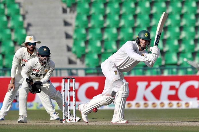 South African batsman Ryan Rickelton plays a shot during the second day of the first Test match between Pakistan and South Africa at the Gaddafi Stadium