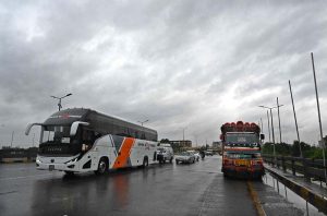 A view of massive traffic jam at Islamabad Expressway during rain that experienced the Federal Capital.