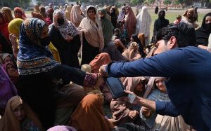 A large number of deserving people wait to receive financial assistance under the Benazir Income Support Programme (BISP) at Government Shaheed Mubeen Shah Afridi Higher Secondary School No. 01 in the provincial capital