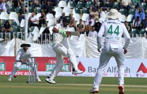 South Africa's players celebrate the dismissal of Pakistani batter Abdullah Shafique during the first day of the second Test match between Pakistan and South Africa at the Rawalpindi Cricket Stadium.
