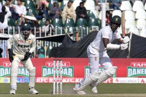 Pakistan's fielder Babar Azam attempts a catch of South Africa's batter Senuran Muthusamy during the third day of the second Test match between Pakistan and South Africa at the Rawalpindi Cricket Stadium.