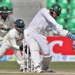 South African batsman Ryan Rickelton hits the ball for high score during the second day of the first Test match between Pakistan and South Africa at the Gaddafi Stadium