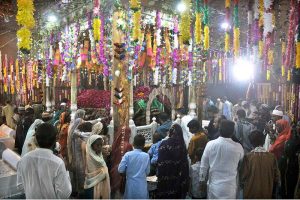 - Devotees offering fateha at the shrine of Hazrat Shah Rukn-e-Alam during the 712th Urs celebrations.