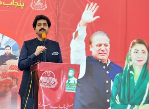 Brides in a group photo during a mass marriage ceremony held under the “Punjab Dhee Rani Program” at Sports Ground.